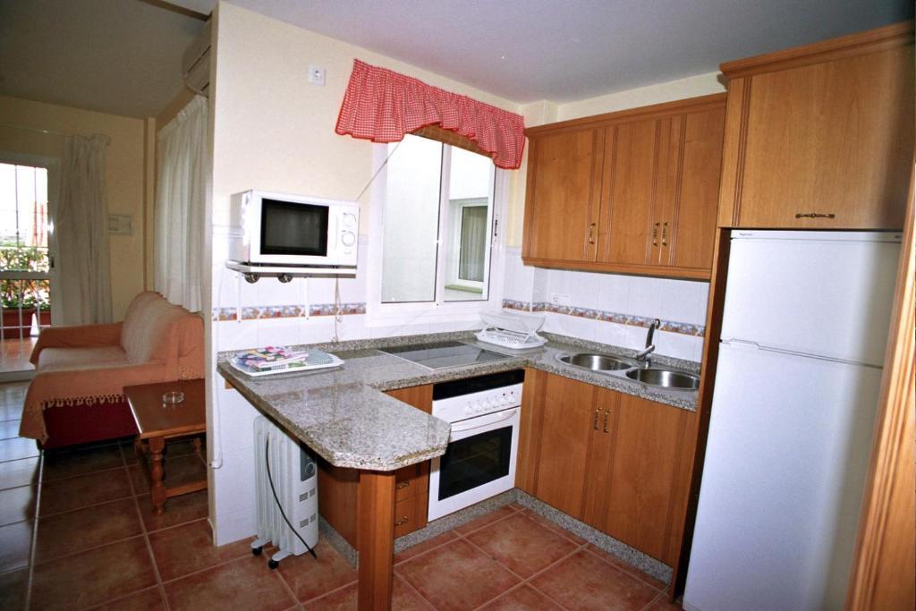 Apartamentos La Casa Del Barrio Maro Cameră foto